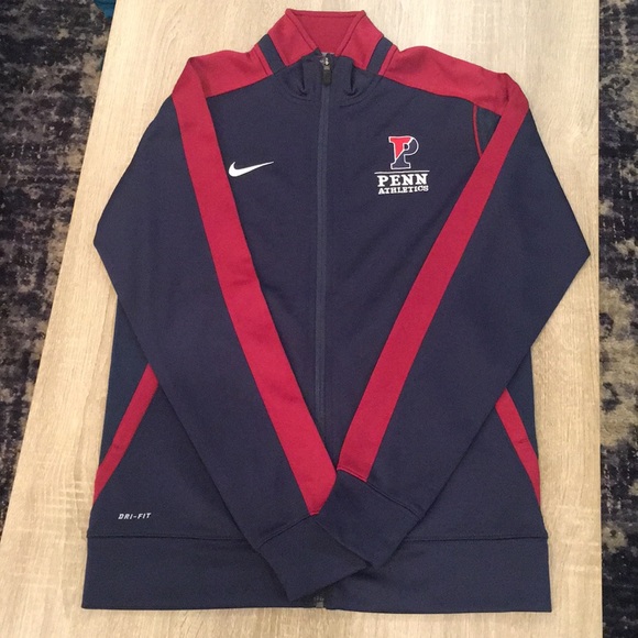 navy blue and red nike shirt